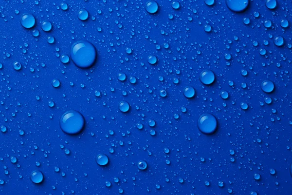 Σταγόνες Νερού Μπλε Φόντο Πάνω Όψη — Φωτογραφία Αρχείου