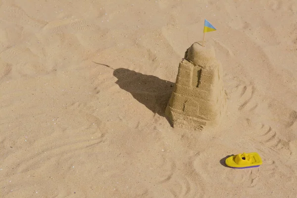 Beautiful Sand Castle Small Ukrainian Flag Toy Boat Beach Space — Zdjęcie stockowe