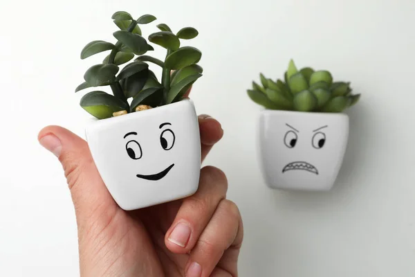 Woman Choosing Potted Plant Happy Face Angry One White Background — Photo
