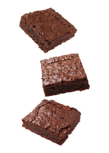 Slices Delicious Chocolate Brownie Flying White Background — Foto de Stock