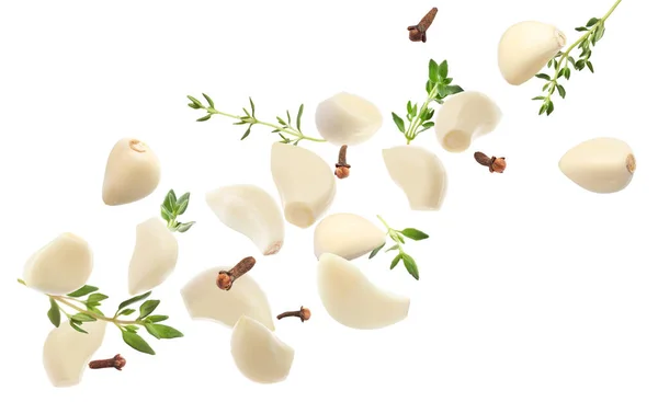 Fresh Peeled Garlic Cloves Thyme Flying White Background — Stock Photo, Image