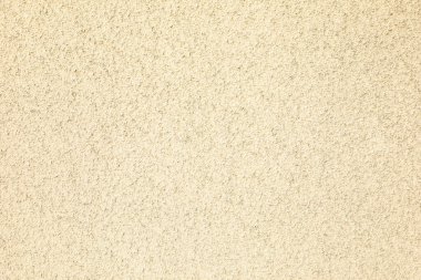 Arkaplan olarak bej alçı duvar dokusu