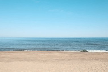 Picturesque view of sandy beach near sea
