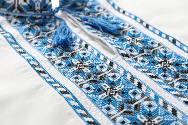 Beautiful Light Blue Ukrainian National Embroidery White Fabric Closeup — Fotografia de Stock