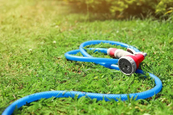 Watering Hose Sprinkler Green Grass Outdoors Space Text — Stockfoto