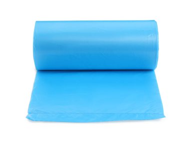 Roll of turquoise garbage bags on white background. Cleaning supplies