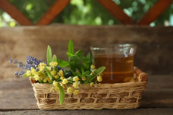 Tasty Herbal Tea Fresh Lavender Flowers Linden Branches Wooden Table — Zdjęcie stockowe