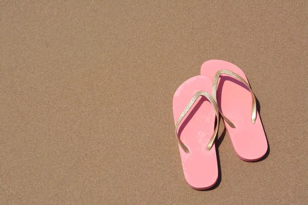 Stylish Pink Flip Flops Wet Sand View Space Text —  Fotos de Stock