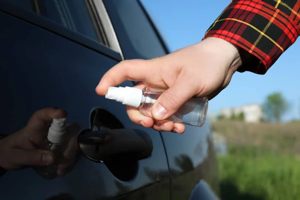 Closeup View Man Disinfecting Car Door Handle Outdoors — 스톡 사진