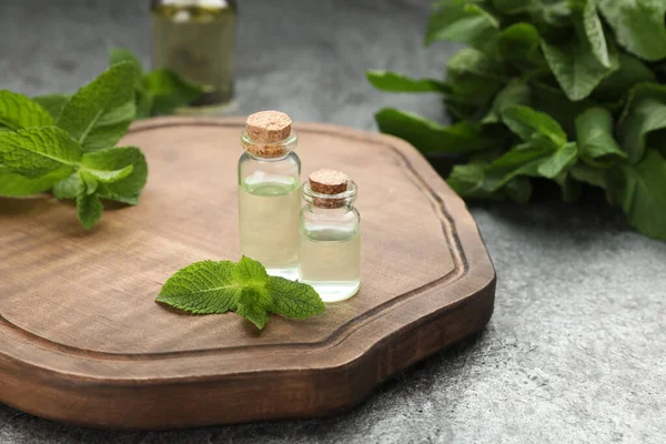 Bottles Essential Oil Mint Grey Table — Stockfoto
