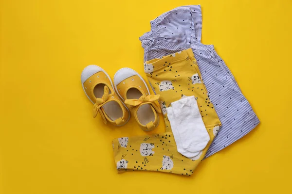 Stylish Child Clothes Shoes Yellow Background Flat Lay — 스톡 사진