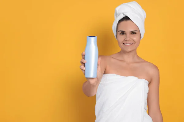 Beautiful Young Woman Holding Bottle Shampoo Orange Background Space Text —  Fotos de Stock