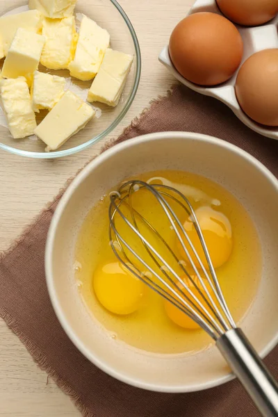 Whisk Eggs Bowl Butter Wooden Table Flat Lay — Foto de Stock