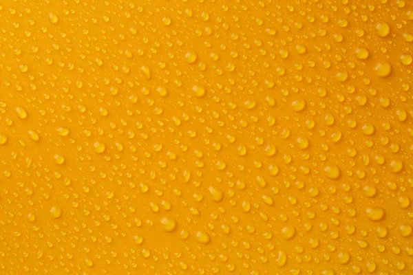 Vízcseppek Narancssárga Háttér Felső Nézet — Stock Fotó