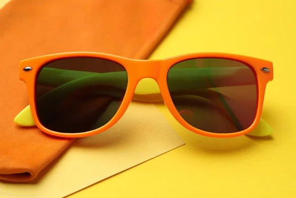 Stylish Sunglasses Bag Yellow Background Closeup — Stockfoto