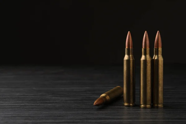 Many Bullets Black Wooden Table Space Text — Stockfoto