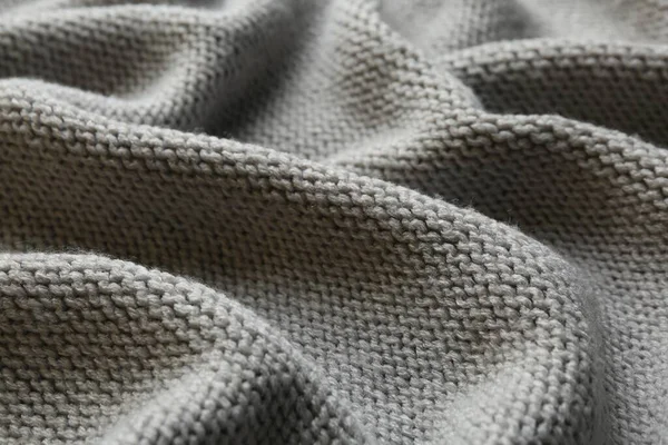 漂亮的灰色针织物为背景 — 图库照片
