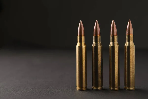 Bullets Black Background Closeup Space Text — 图库照片