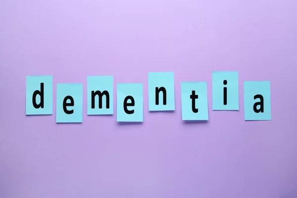 Word Dementia Made Paper Notes Violet Background Flat Lay — Foto de Stock