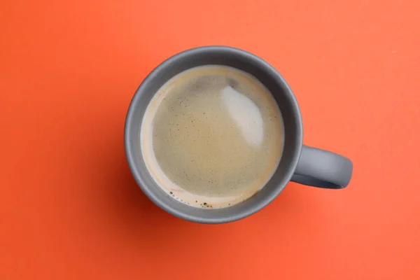 Grey Mug Freshly Brewed Hot Coffee Orange Background Top View — 스톡 사진