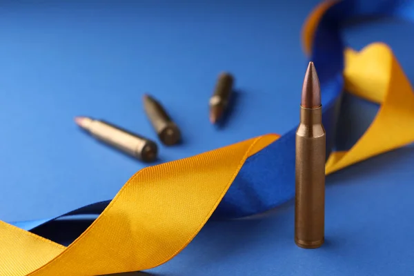 Ribbons Colors National Ukrainian Flag Bullets Blue Background Closeup Space — kuvapankkivalokuva