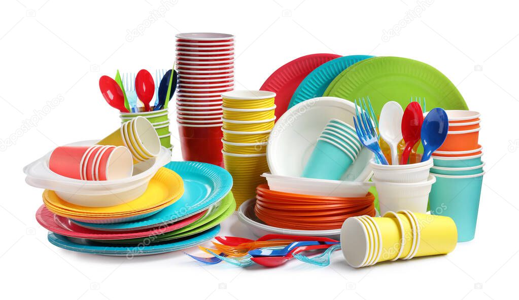 Set of different disposable tableware on white background