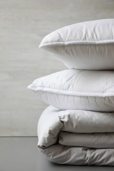 Soft Folded Blanket Pillows Light Grey Table Closeup — Stockfoto