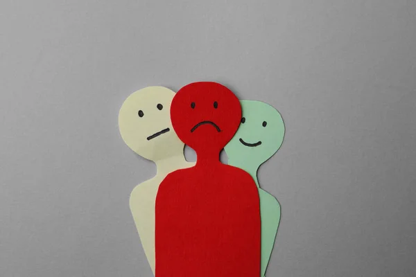 Colorful Paper Cutouts Person Different Emotions Grey Background Top View — стоковое фото