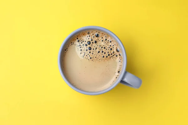 Grey Mug Freshly Brewed Hot Coffee Yellow Background Top View — Stock fotografie