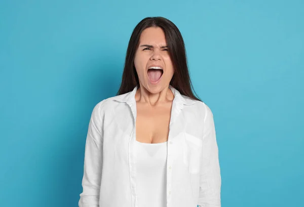 Aggressive Young Woman Shouting Turquoise Background — Fotografia de Stock