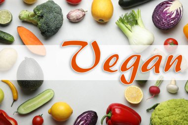 Word Vegan and fresh vegetables on white background, flat lay