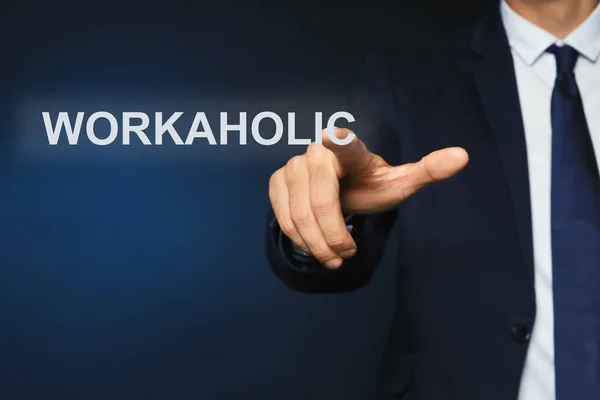 Man Pointing Word Workaholic Virtual Screen Dark Background — 图库照片