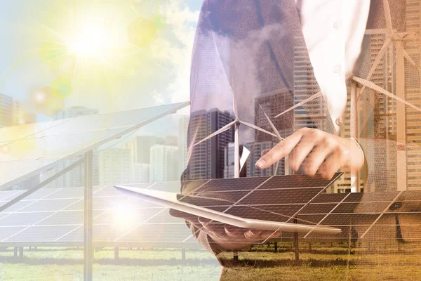 Multiple Exposure Businesswoman Tablet Wind Turbines Solar Panels Installed Outdoors — Stockfoto