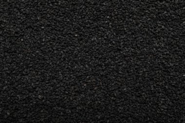 Arkaplan olarak siyah susam yığını, üst görünüm