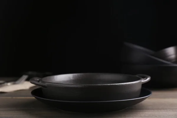 Black Serving Pan Plate Wooden Table Space Text —  Fotos de Stock