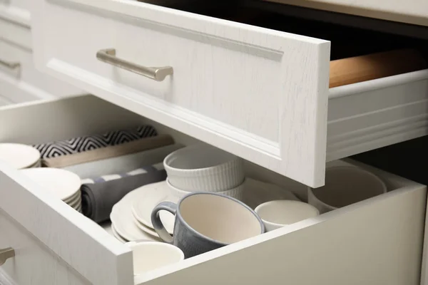 Open Drawers Kitchen Cabinet Different Dishware Towels — Zdjęcie stockowe