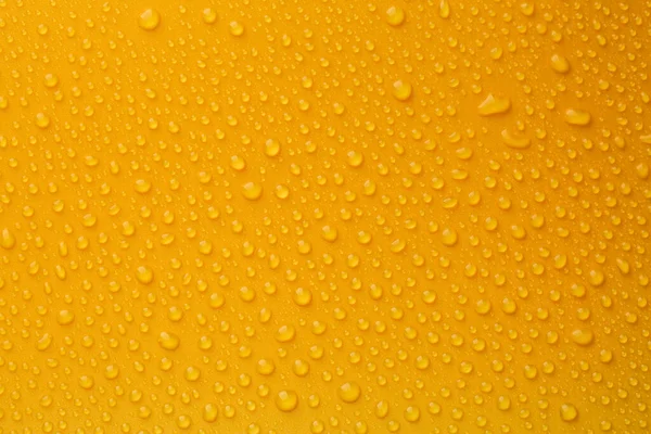 Water Drops Orange Background Top View — Stock fotografie
