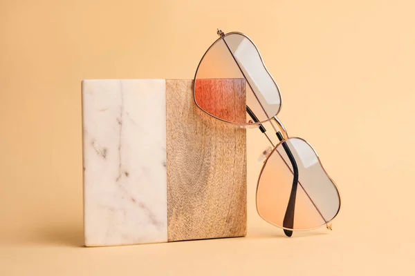 Stylish Elegant Heart Shaped Sunglasses Beige Background — стоковое фото