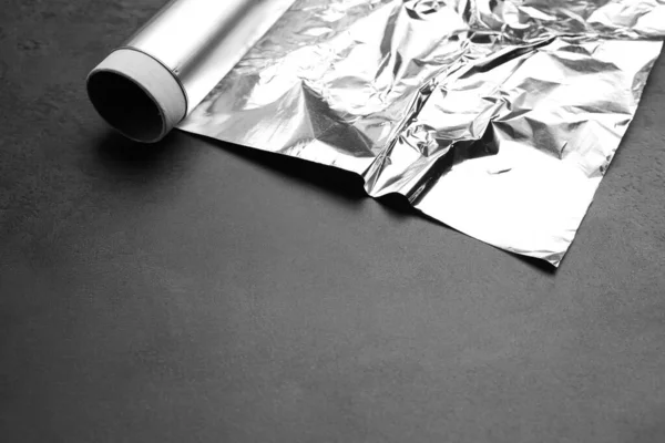 Roll Aluminum Foil Grey Dark Table Closeup Space Text — 图库照片