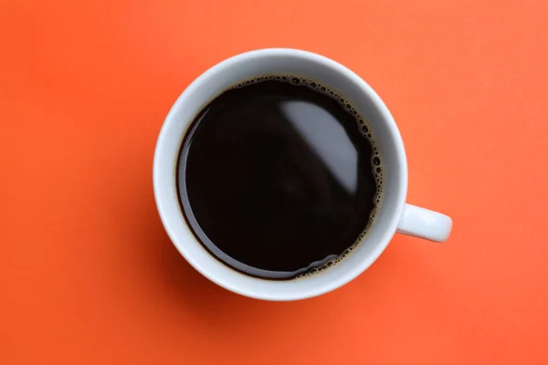 White Mug Freshly Brewed Hot Coffee Orange Background Top View — Stock fotografie