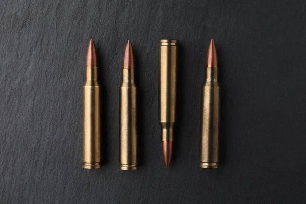 Many Bullets Black Table Flat Lay Military Ammunition — Stockfoto