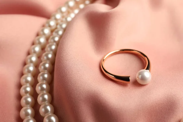 Elegant Necklace Ring Pearls Pink Silk Closeup — Fotografia de Stock