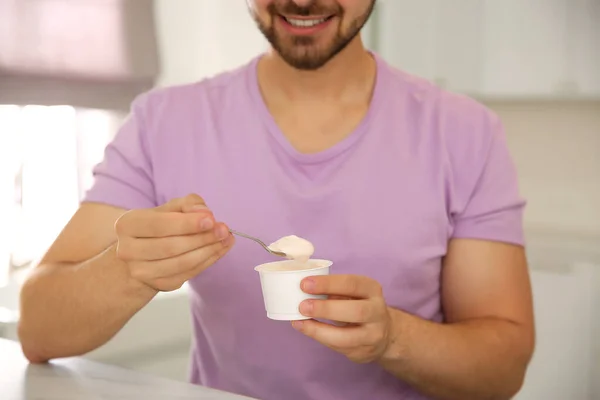 Happy Young Man Tasty Yogurt Table Kitchen Closeup — 图库照片