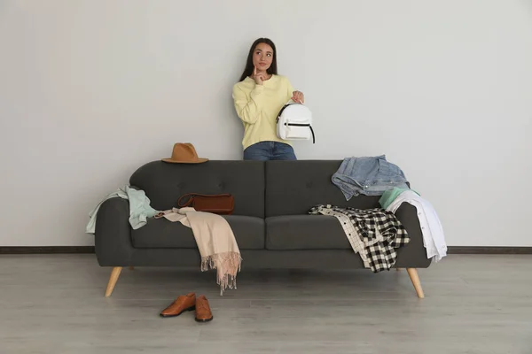 Young Woman Holding Backpack Sofa Clothes Indoors — ストック写真