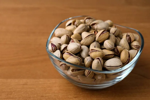 Bowl Pistachio Nuts Wooden Table Space Text — ストック写真