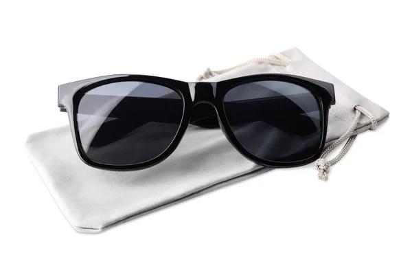 Stylish Sunglasses Grey Cloth Bag White Background — стоковое фото