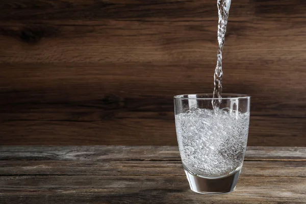Pouring Soda Water Glass Wooden Table Space Text — 스톡 사진