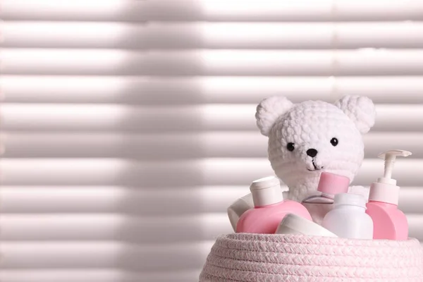 Wicker Basket Baby Cosmetic Products Knitted Toy Bear Window Closeup —  Fotos de Stock