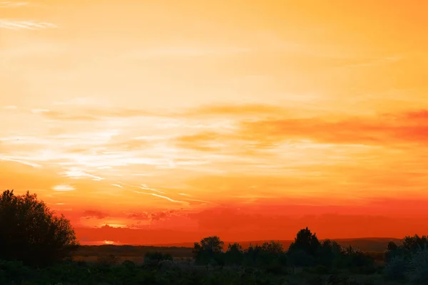 Picturesque view of beautiful orange sky at sunset