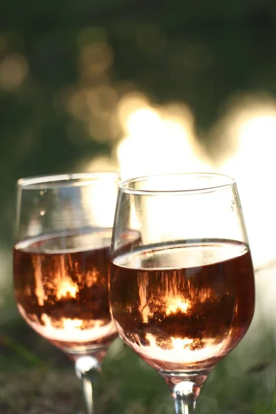 Glasses Tasty Rose Wine Blurred Background Closeup Picnic Season — Stock fotografie